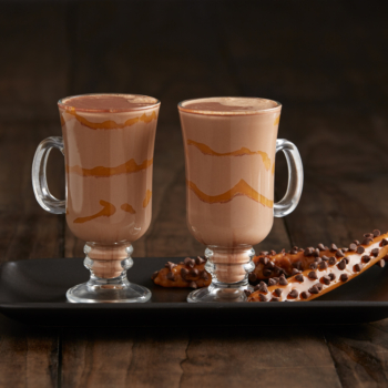 Image of two glass of caramel hazelnut mochas on a tray.