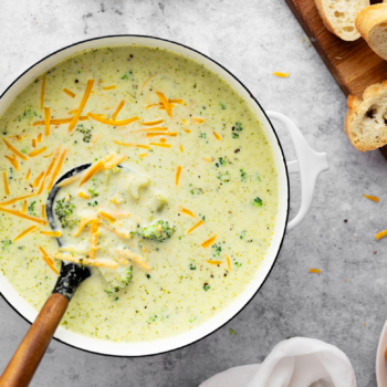 Image of creamy broccoli cheddar soup in a pot.