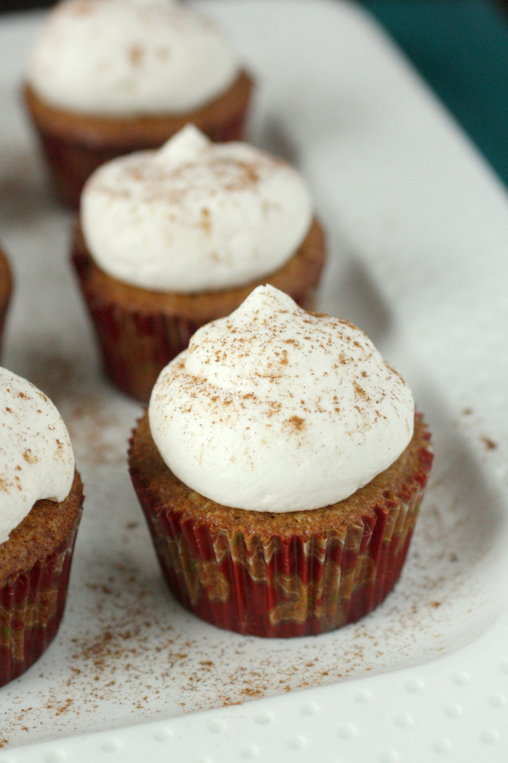 Image of gingerbread cupcakes on a serving platter.