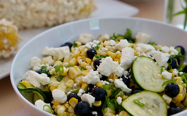 Image of grilled summer cord blueberry and zucchini salad in a bowl.