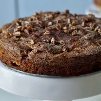 Image of Hanukkah apple cake on a cake stand.