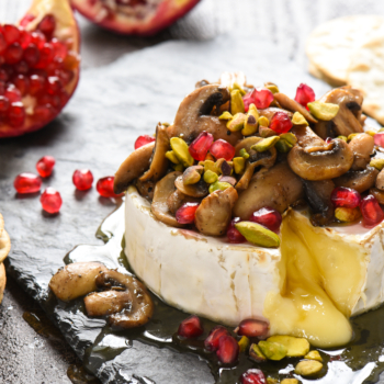 Image of melty holiday baked brie.
