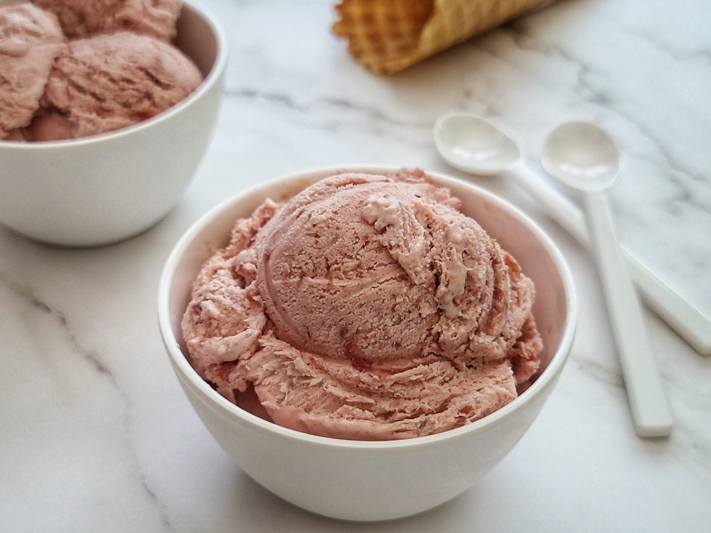 Image of cherry ice cream in a bowl.