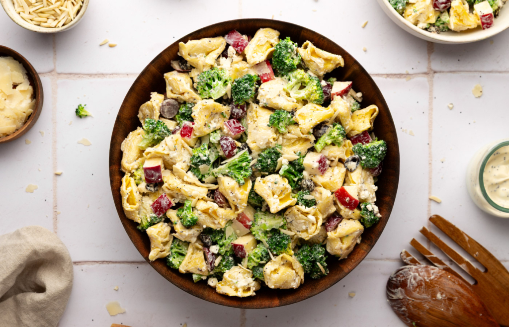 Image of Chopped Broccoli Salad with Cheese Tortellini in a large serving bowl.